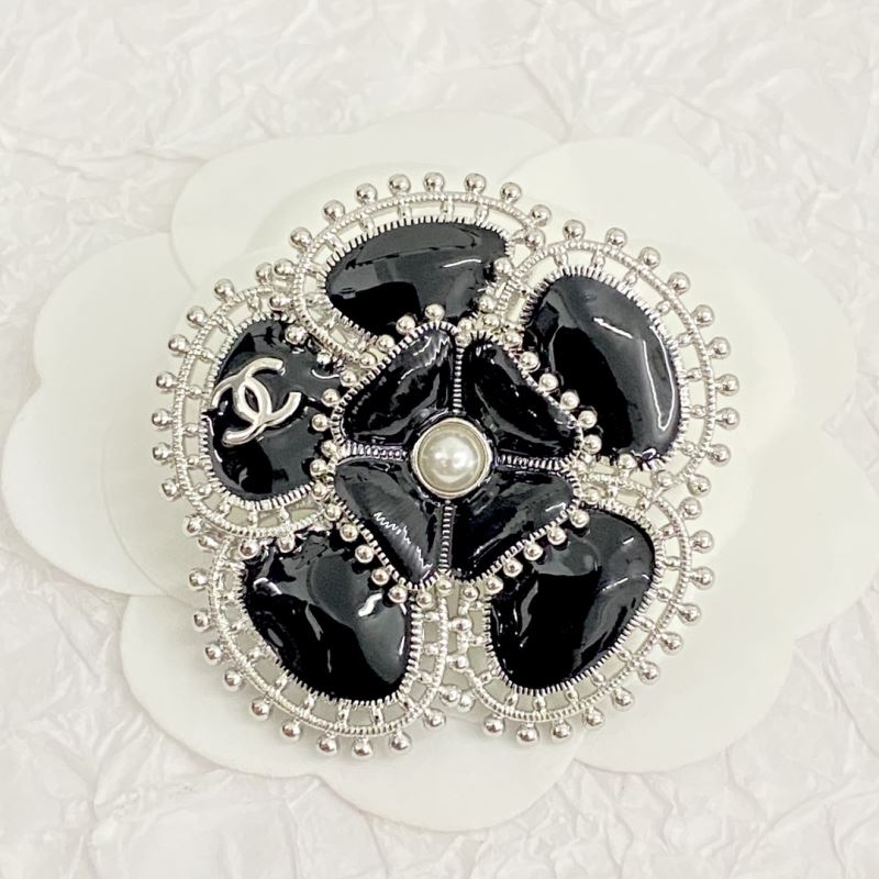 Ch**el brooches
